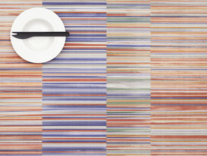 Overhead view of a colourful striped placemat