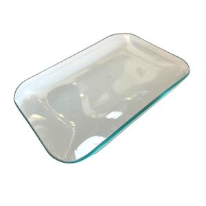 A rectangular clear glass soap dish with a slightly beveled edge.
