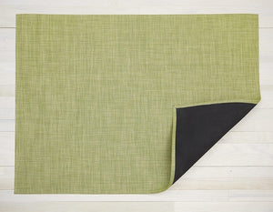 a rectangular floor mat made of eco friendly vinyl in soft dill green