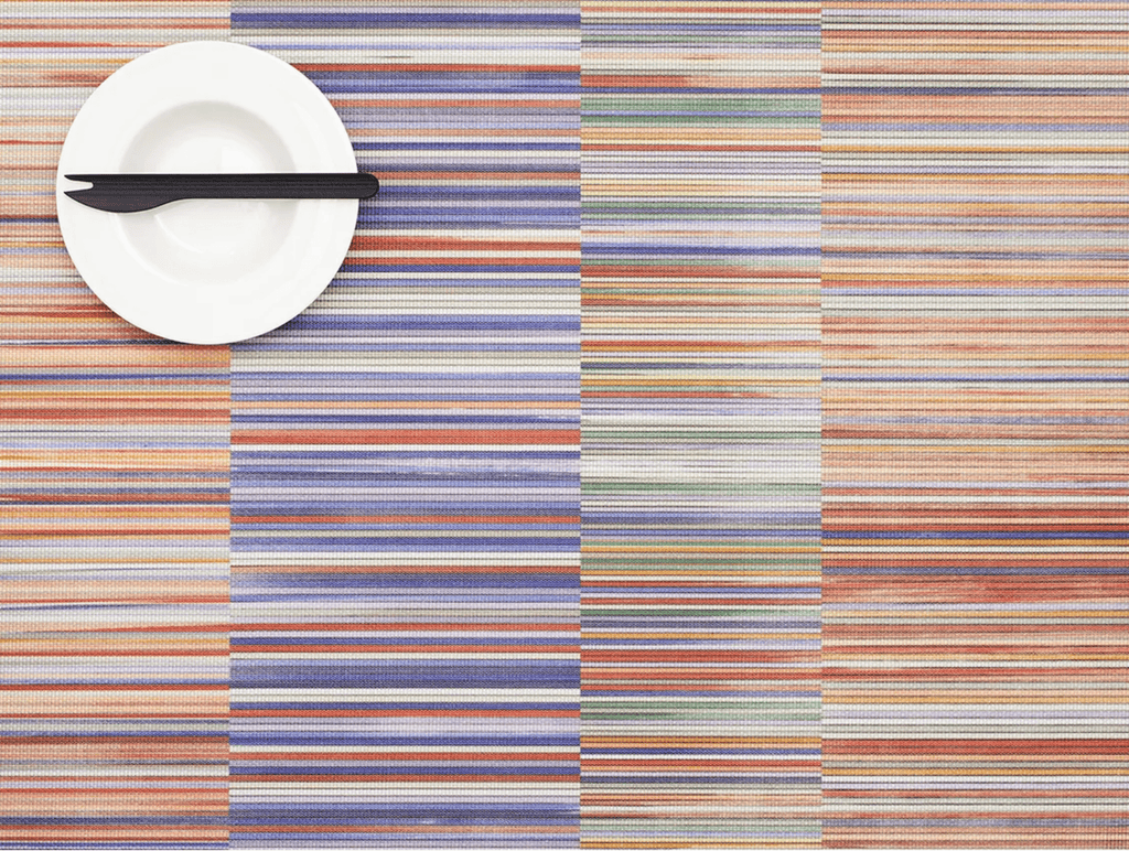 Overhead view of a colourful striped placemat