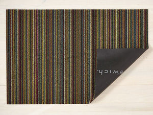 a rectangular floor mat in a skinny stripe design in bright multi colours, made of eco friendly looped vinyl yarn, backed with black commercial rubber