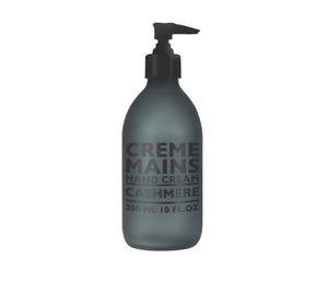 Compagnie de Provence Cashmere hand cream in a glass bottle with a pump.