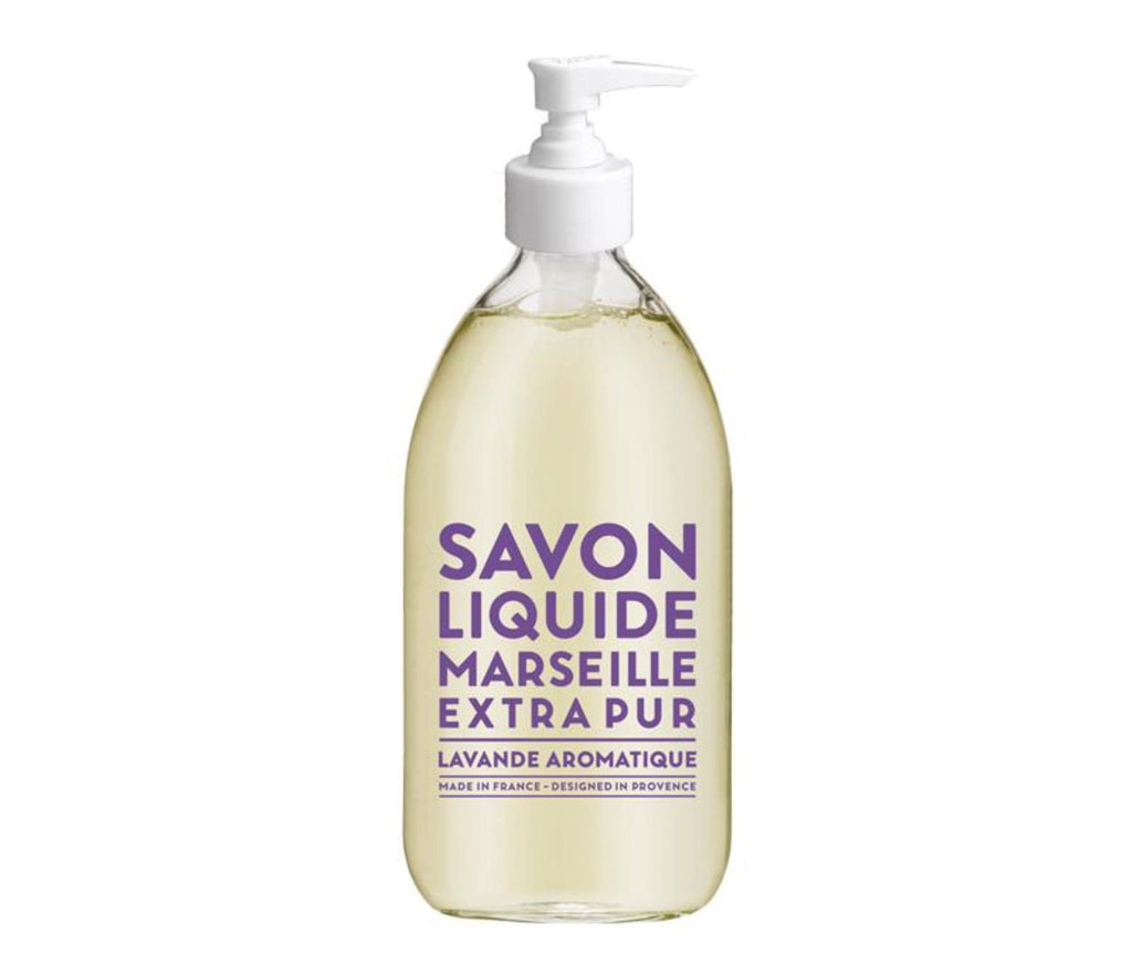Compagnie de Provence Lavender liquid soap in a  refillable, clear glass, 500mL bottle with modern, lavender block letters and a pump dispenser