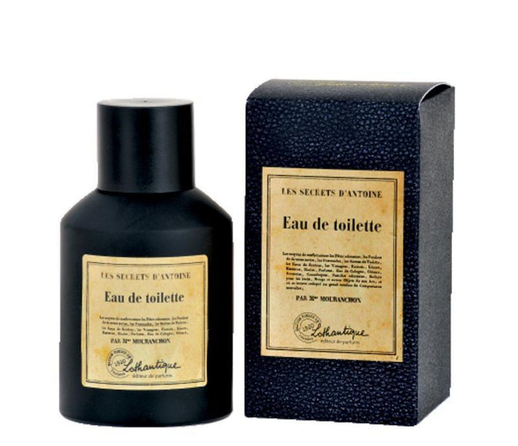 Black, glass eau de toilette bottle and box. An aged paper label says Les Secrets d'Antoine eau de toilette and has the Lothantique logo on the bottom