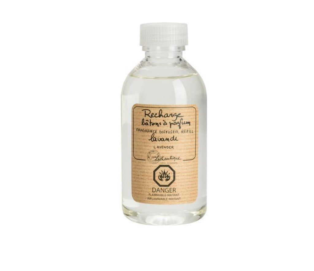 A clear, plastic bottle of Lavender scented diffuser refill liquid, with a beige label printed with the words "Rechard batons a parfum, fragrance diffuser refill, lavande, lavender," the Lothantique logo and a danger flammable symbol