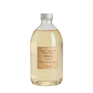 Clear plastic bottle of verbena scented foam bath. A striped beige label is printed with the words "bain moussant, bath foam, verveine, verbena, 500mL - 16.66 fl oz" and the Lothantique logo.