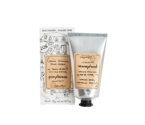 Grapefruit scented shea butter hand cream in a silver tube with a striped beige label printed with "creme mains, hand cream, beurre du karite, shea butter, pamplemousse, grapefruit" and the Lothantique logo, to the left is a white box, with the same label and line drawings of French houses.