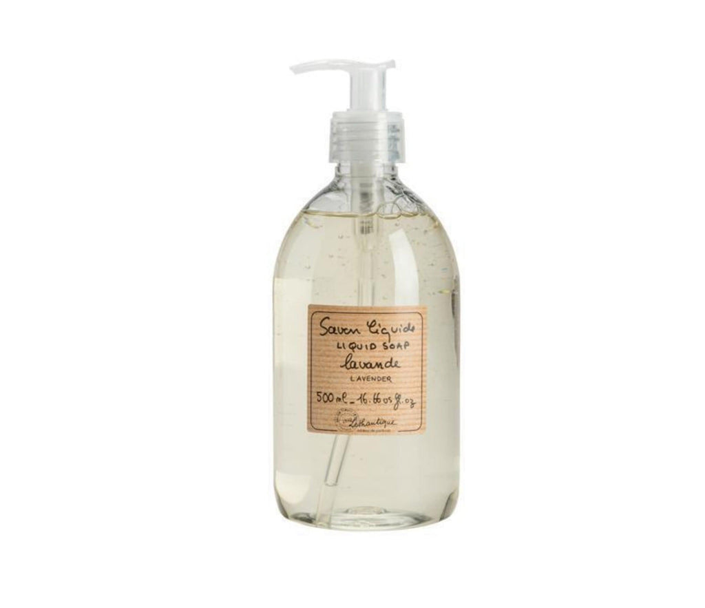  clear plastic bottle of lavander scented French liquid soap with a white pump. A beige, subtly striped label is printed with the product description and Lothantique logo