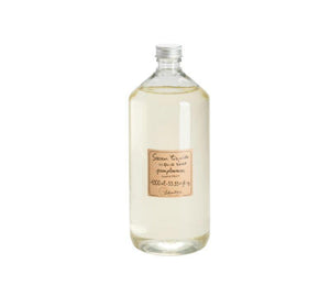 Grapefruit scented liquid soap in a 1litre, plastic refill bottle with a silver cap. They beige striped label is printed with "savon liquide, liquid soap, pamplemousse, grapefruit, 1000mL, 33.33 fl oz" and the Lothantique logo.